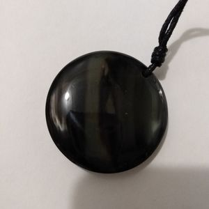 J. Jill round pendant made of upcycled horn with marbled appearance. Beautiful.